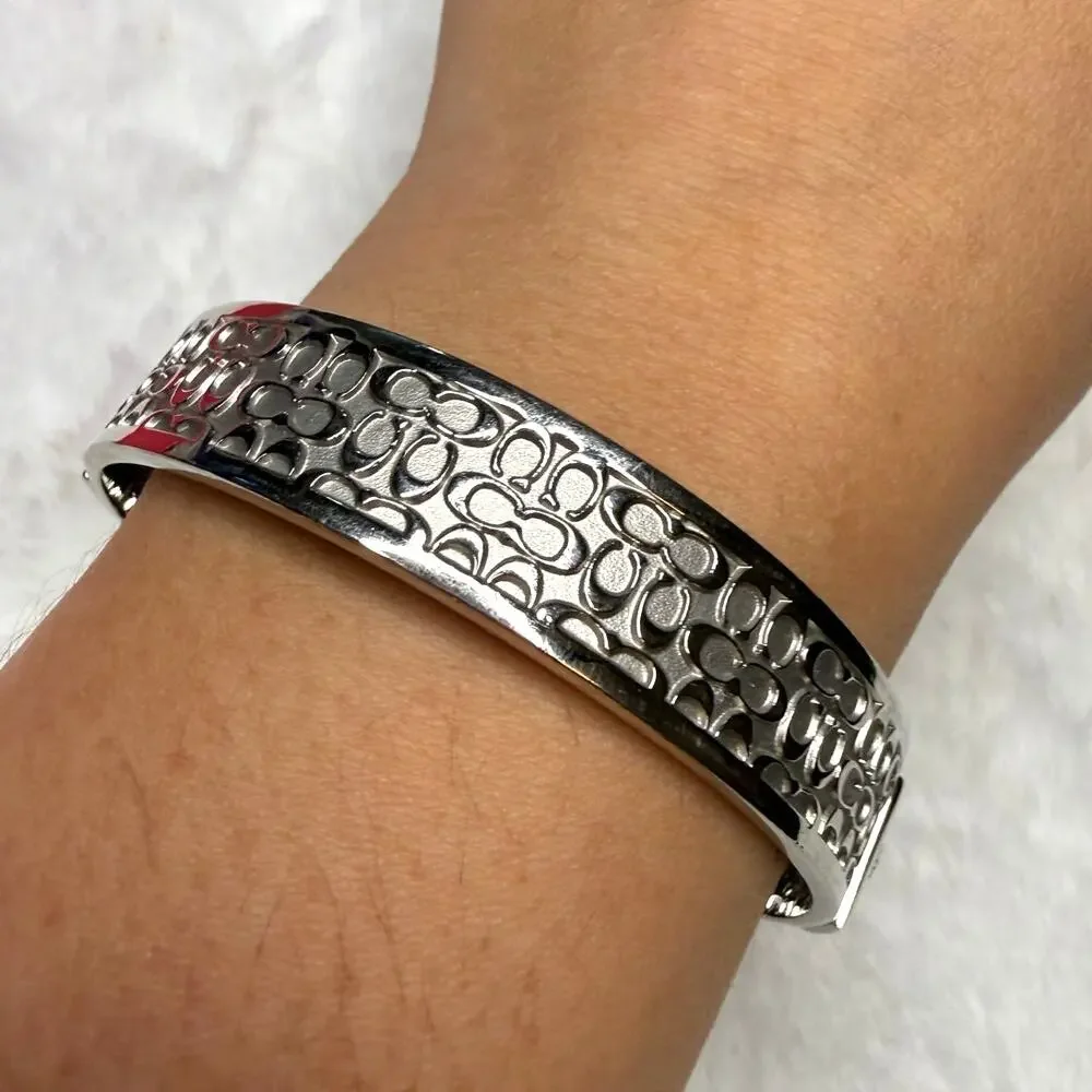 COACH Silver-Tone Quilted C Bangle Bracelet - Picture 3 of 7